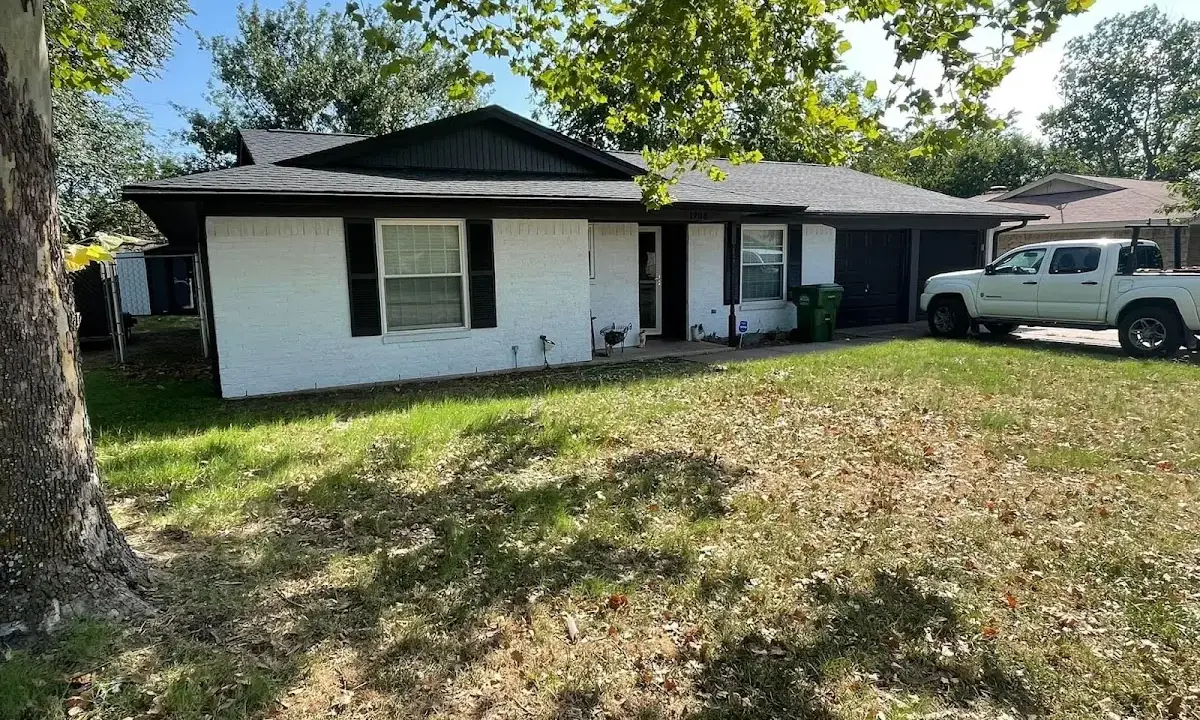 Professional roofing crew working on a residential roof in Merritt Island